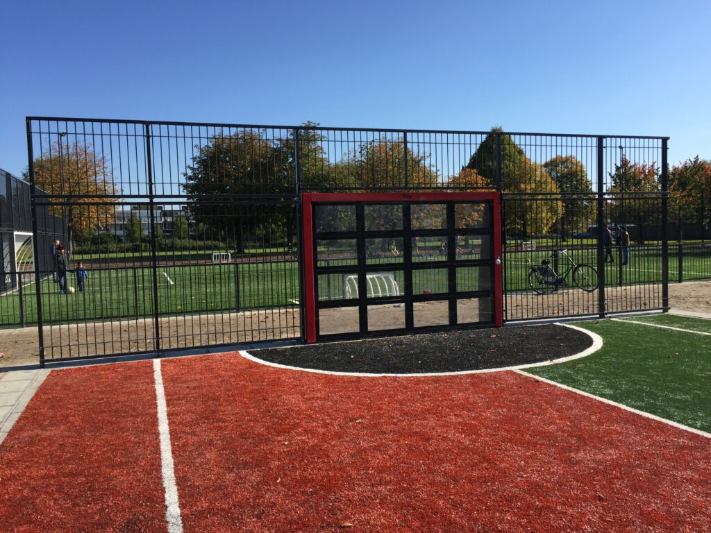 sportvloer, sportvloeren, buiten sportvloer, waterdoorlatende sportvloer, drainbeton, drainbeton sportvloer, kunstgras